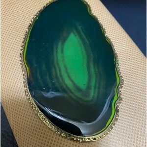 Large Green glass pendant. Very unique and would look great with gold necklace.